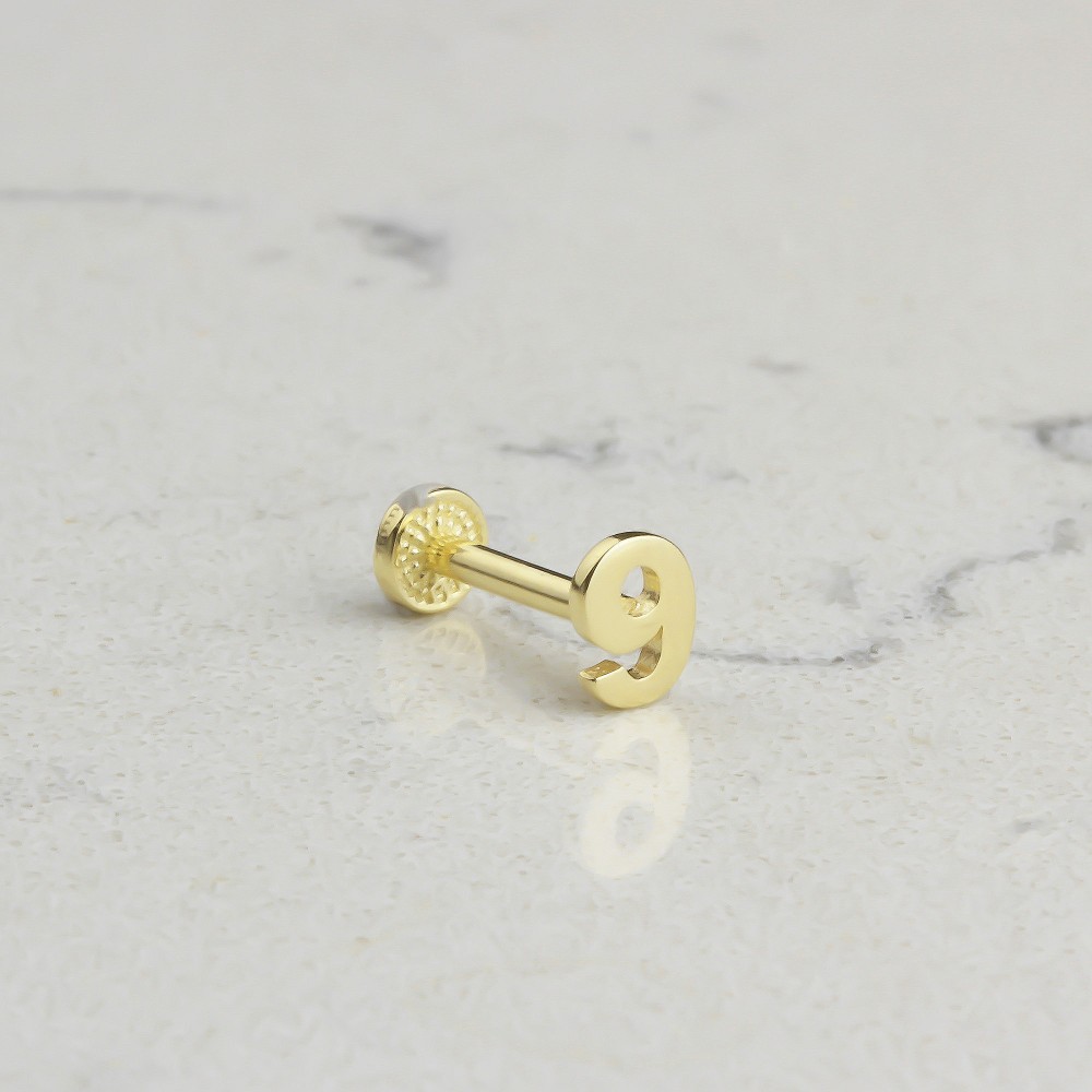 Glorria Altın 9 Rakam Tragus Piercing Glorria Altın 9 Rakam Tragus Piercing